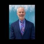 Dr Wallace Brucker